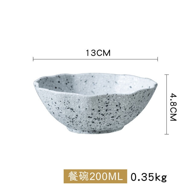 Vajilla de cerámica con diseño de granito